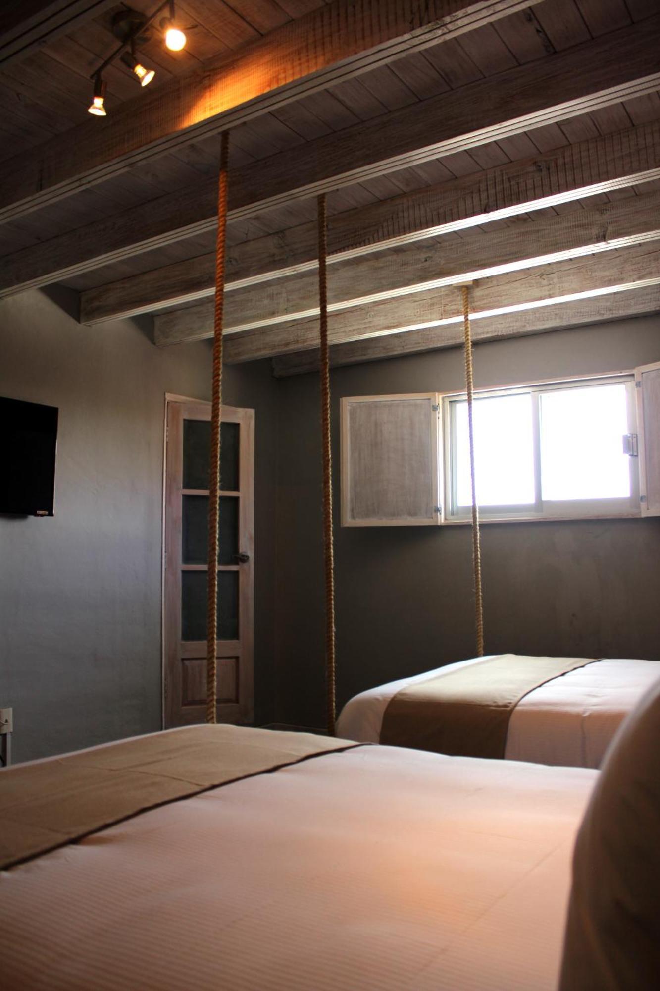 Hotel Damiana Boutique Querétaro Oda fotoğraf